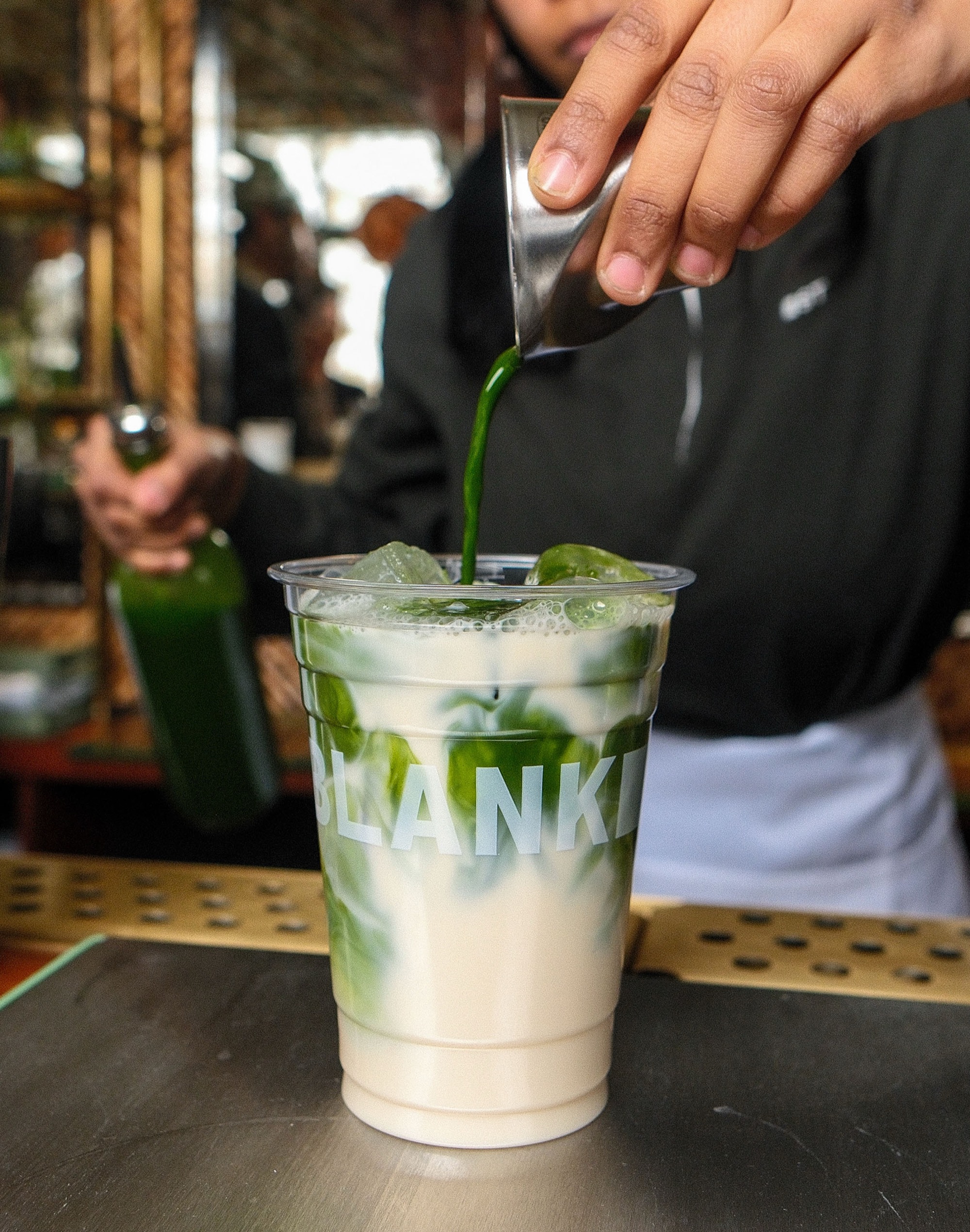 Barista making matcha